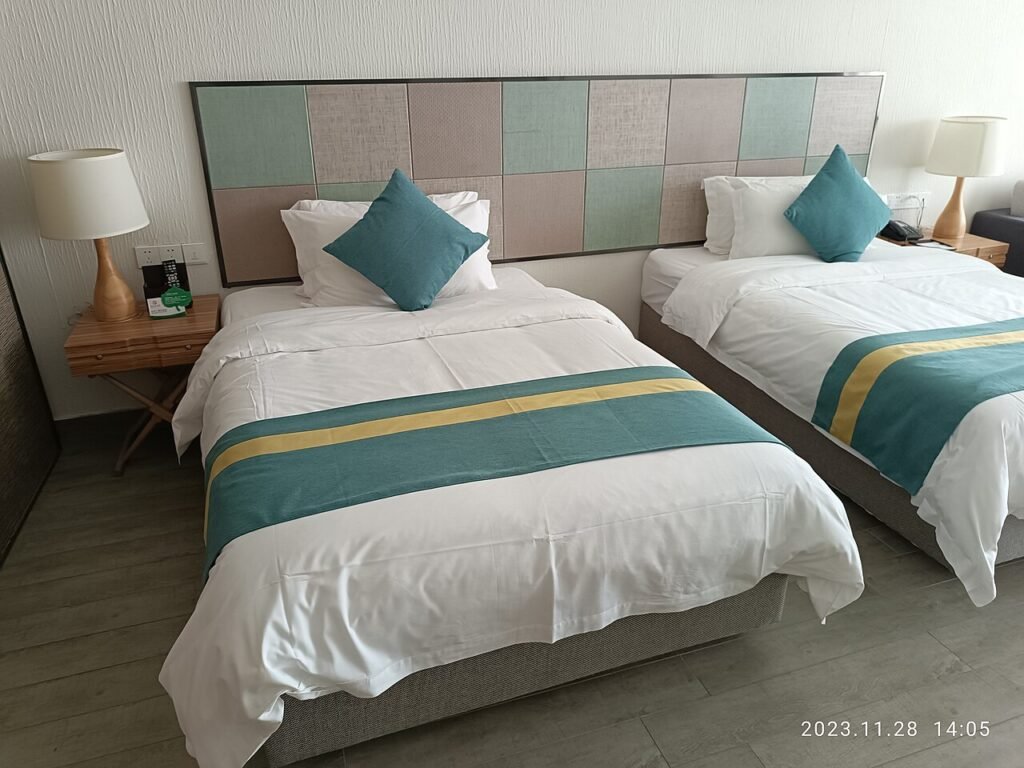 Comfortable bed in a bright bedroom