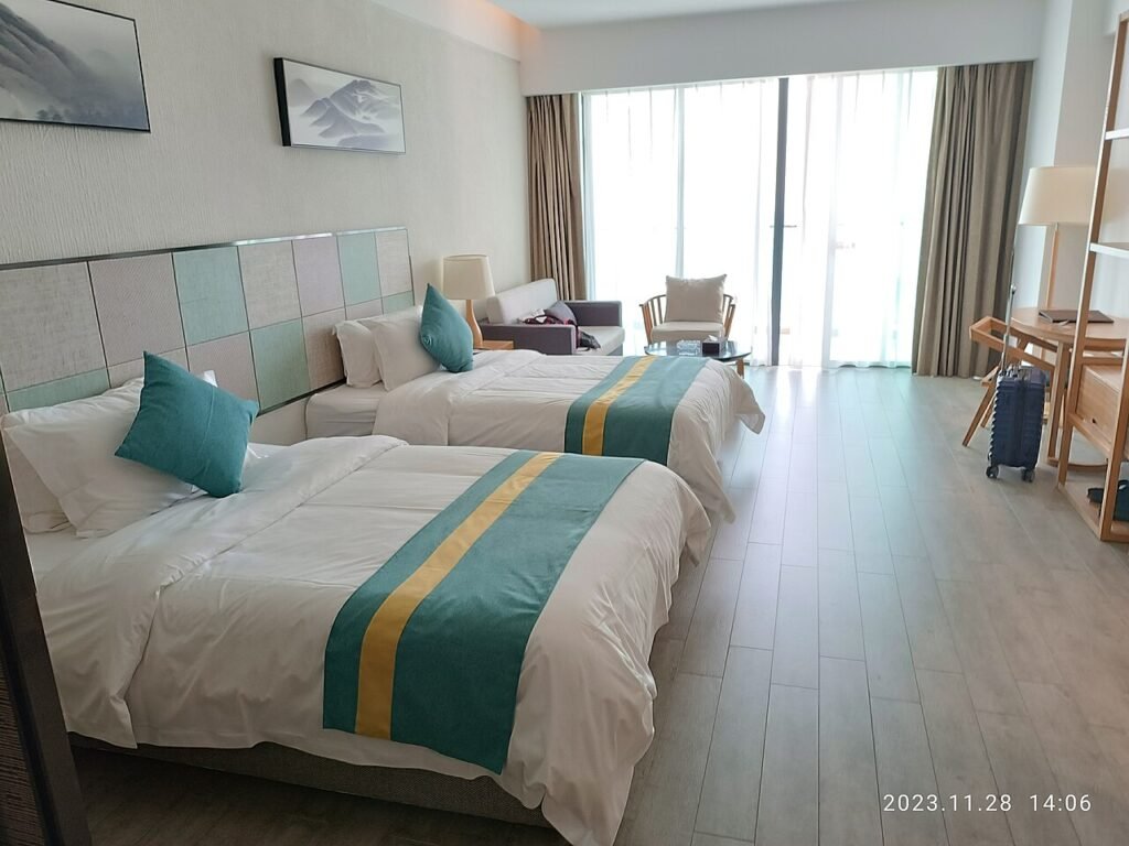Comfortable bed in a bright bedroom