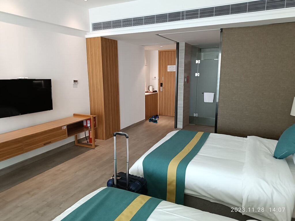 Comfortable bed in a bright bedroom