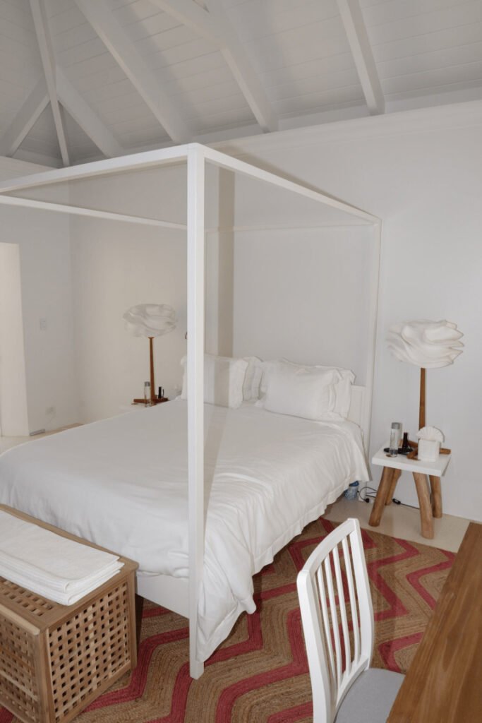 Comfortable bed in a bright bedroom