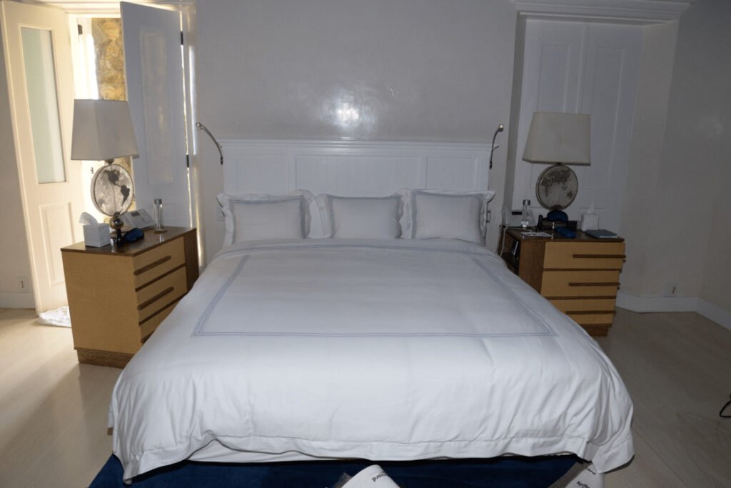 Comfortable bed in a bright bedroom